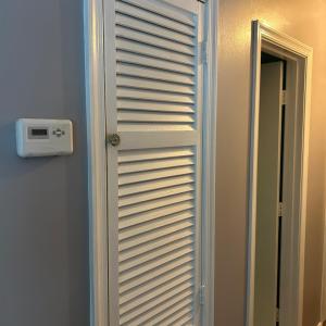 Linen closet in hall.