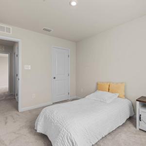 The closet door. Leaving the room, the first door on the right is a large linen closet, then the hall full bath, and then bedroom 4 at the end.