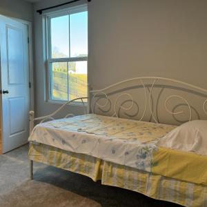 Bedroom 4 on the back left of the house