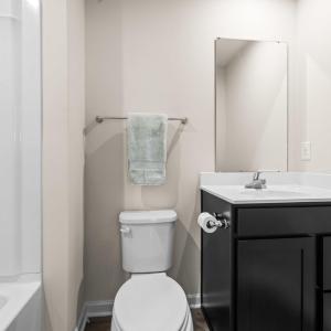 The upstairs hall bath is between bedrooms 3 and 4 on the back of the house.