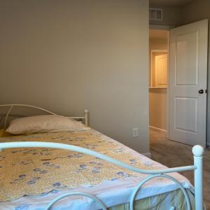 Showing a single width bed, 2 other walls can accomodate a queen width easily too