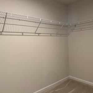 Huge 10'10'x5'5" primary suite closet