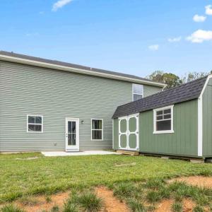 Seller added a terrific shed on the back of the house~ which conveys.