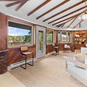 MAIN FLOOR DEN OVERLOOKING TIMBERLAKE