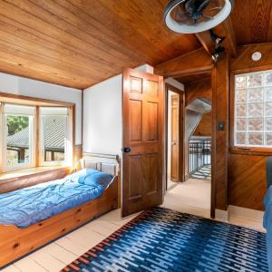 UPPER LEVEL BEDROOM ACCESSED BY CAT WALK