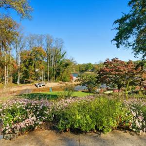 LOWER LEVEL PATIO VIEW TO DOCK & TIMBERLAKE