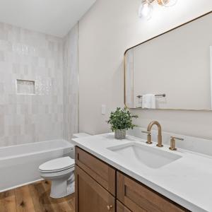 Second full bathroom with tile tub/shower