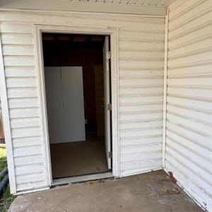 The back patio has the storage room! So helpful!