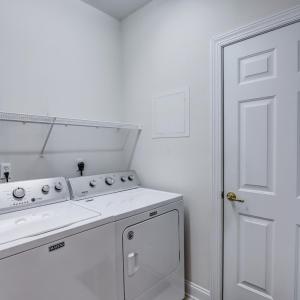 Laundry room conveniently opens to 1 car garage