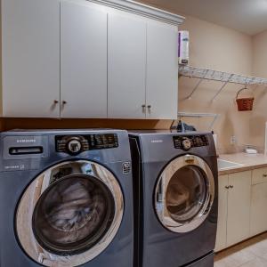 Large laundry room with ample cabinet space!