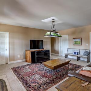 Terrace level den with walkout to pool and hot tub