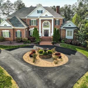 Welcome to 107 Emory Way situated at the front entrance of Poplar Grove Golf Course!! 1.71 acres on the 6th and 7th hole of this beautiful Sam Snead course!