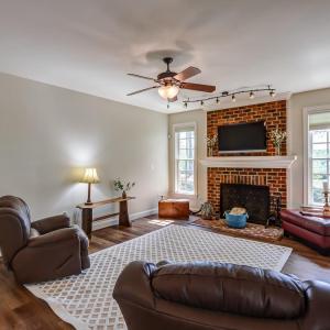 Large spacious den with beautiful views, wood burning fireplace and lots of space!