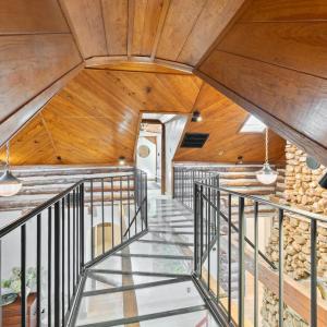 Plexiglass Walkway connecting Upper BRs & above the Living Room