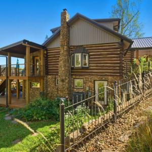 SIDE VIEW FROM DRIVE TO DECK & LOWER LEVEL PATIO