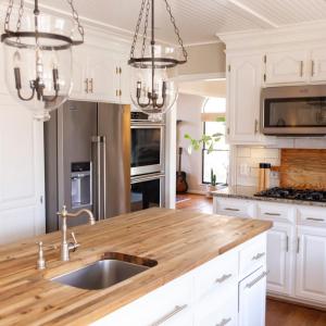 Kitchen with 2 dishwashers, pre sink and kitchen sink, double oven, gas cook top and built in microwave