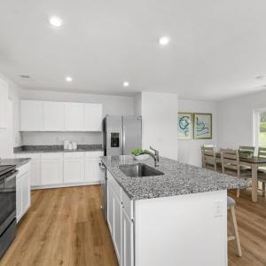 Similar to Photo - Kitchen & Dining Area