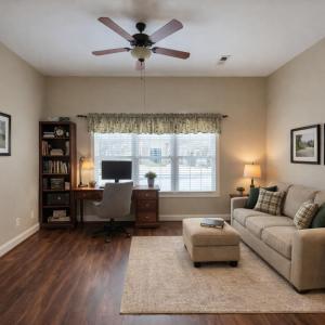 Flex space off of primary bedroom virtually staged as Den.