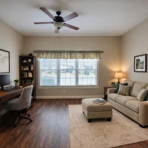 Flex space off of primary bedroom virtually staged as office and den combo.