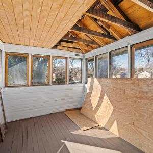 The sunporch needs to be flashed when the back roof is replaced. Materials here convey.