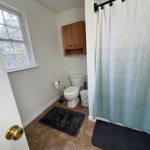 Bath off primary bedroom on first floor.
