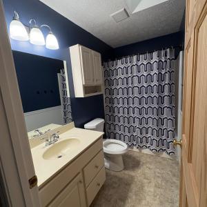 bath off upstairs bedroom.