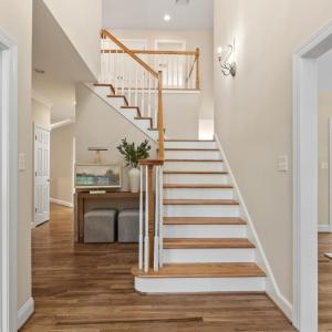 Welcome to 1547 Gilfield Drive.  This stunning custom home has the most beautiful grand entrance.  To the right, is a formal living room and to the left is an office space or potential main level bedroom (there is an adjoining full bathroom here as well).