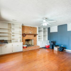 Rec Room/Office with Wood Burning Fireplace. Double Doors leading to the patio already wired for a Hot Tub