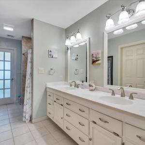 Primary bath - double sink vanity with Corian countertop