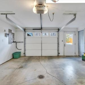 One of two garage bays in lower level