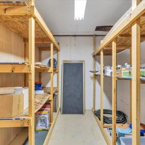 Storage room with all concrete walls - could be finished into a safe room-