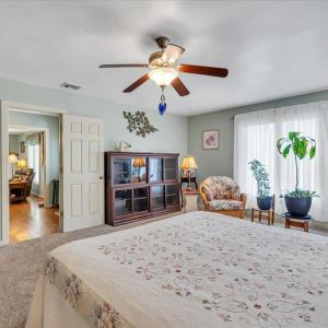 Primary bedroom with room for seating area