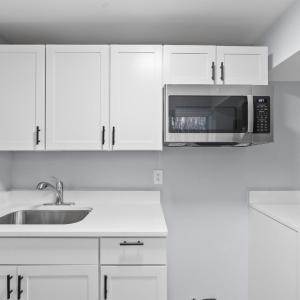 Full Kitchen in basement. All you need to bring is the Fridge and Electric Oven