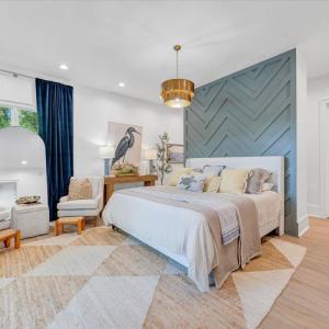 The primary ensuite offers a private oasis including a second laundry space!