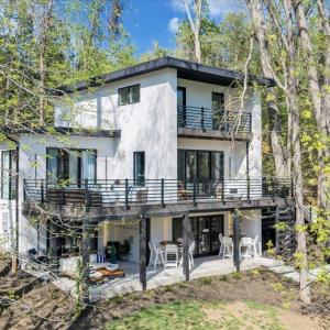 Connected to county sewer—eliminating guest limitations often associated with septic systems—this property offers added convenience and flexibility. Optimized for short-term rental success, the property offers accommodations for up to 22 guest!