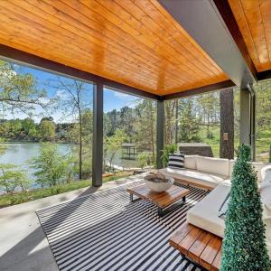 This one of a kind property offers almost 2,000 square feet of covered and open-air outdoor living space overlooking scenic beauty of Smith Mountain Lake!