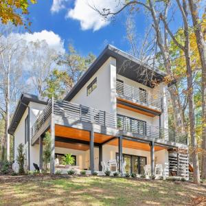 THIS PROPERTY IS ON COUNTY SEWER AT THE LAKE!  This contemporary new construction lake front home is located at one of the most convenient locations on the lake! Only minutes to Bridgewater offering marina, shopping, dining, live music, coffee shop, ice cream, mini golf, and more!