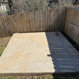 Concrete slab perfect for firepiit or placing a storage shed there