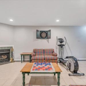 Basement rec room with easy maintenance ceramic tile floor