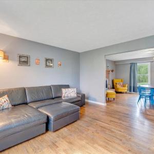 Living room opens to the main level family room