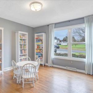 Light-filled formal dining room, currently used for home schooling