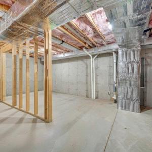 Full unfinished basement in the addition, with a rough-in for the bath and a chair lift to go up and down to the main level