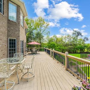 Expansive deck space overlooking the grounds and pool