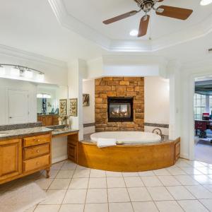 Primary bathroom unsuited with jacuzzi tub, and fireplace!