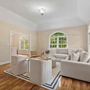 Formal living room with lots of natural light