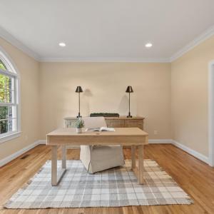 Office with adjoining full bathroom with walk-in shower.  This room could be used as a main level bedroom as well.