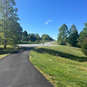 Cul de sac lot with paved drive. Street view from front yard.
