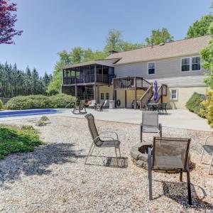 Fenced pool, fire pit area with large oversized patio area for additional seating or parties