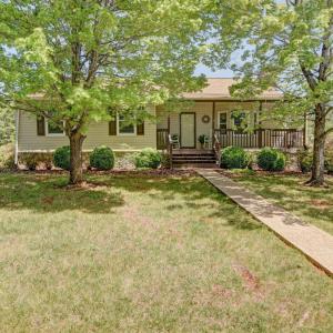 Entry to the property - with warm welcoming porch, multiple seating areas around the entire house, covered, screened and open - your choice and then opens up for a great home to make your own!