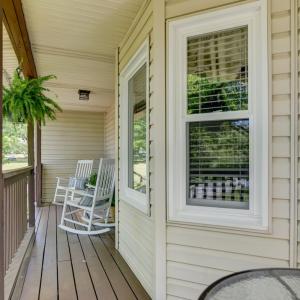 front entry porch with table seating area at the end.